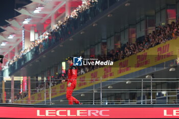 2023-11-26 - LECLERC Charles (mco), Scuderia Ferrari SF-23, portrait celebrates his second place on podium during the 2023 Formula 1 Etihad Airways Abu Dhabi Grand Prix, 22th round of the 2023 Formula One World Championship from November 24 to 26, 2023 on the Yas Marina Circuit, in Abu Dhabi - F1 - ABU DHABI GRAND PRIX 2023 - RACE - FORMULA 1 - MOTORS