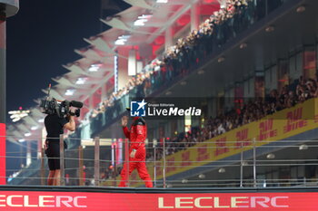 2023-11-26 - LECLERC Charles (mco), Scuderia Ferrari SF-23, portrait celebrates his second place on podium during the 2023 Formula 1 Etihad Airways Abu Dhabi Grand Prix, 22th round of the 2023 Formula One World Championship from November 24 to 26, 2023 on the Yas Marina Circuit, in Abu Dhabi - F1 - ABU DHABI GRAND PRIX 2023 - RACE - FORMULA 1 - MOTORS