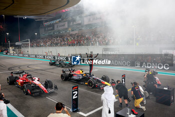 2023-11-26 - VERSTAPPEN Max (ned), Red Bull Racing RB19, portrait celebrates after his victory during the 2023 Formula 1 Etihad Airways Abu Dhabi Grand Prix, 22th round of the 2023 Formula One World Championship from November 24 to 26, 2023 on the Yas Marina Circuit, in Abu Dhabi - F1 - ABU DHABI GRAND PRIX 2023 - RACE - FORMULA 1 - MOTORS