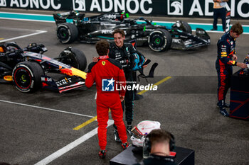 2023-11-26 - RUSSELL George (gbr), Mercedes AMG F1 Team W14, portrait LECLERC Charles (mco), Scuderia Ferrari SF-23, portrait during the 2023 Formula 1 Etihad Airways Abu Dhabi Grand Prix, 22th round of the 2023 Formula One World Championship from November 24 to 26, 2023 on the Yas Marina Circuit, in Abu Dhabi - F1 - ABU DHABI GRAND PRIX 2023 - RACE - FORMULA 1 - MOTORS