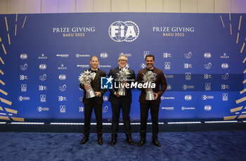 2023-12-08 - BAUMEL Mathieu, FIA World Rally-Raid Championship Co-Driver - Champion, CARLUCCI Andrea, AL-ATTIYAH Nasser, FIA World Rally-Raid Championship - Champion, portrait during the 2023 FIA Prize Giving Ceremony in Baky on December 8, 2023 at Baku Convention Center in Baku, Azerbaijan - FIA PRIZE GIVING 2023 - BAKU - FORMULA 1 - MOTORS