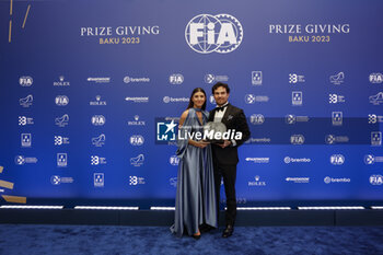 2023-12-08 - PEREZ Sergio, FIA Formula One World Championship - 2nd Place, portrait with his girlfriend Carola Martinez during the 2023 FIA Prize Giving Ceremony in Baky on December 8, 2023 at Baku Convention Center in Baku, Azerbaijan - FIA PRIZE GIVING 2023 - BAKU - FORMULA 1 - MOTORS