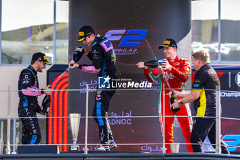 2023-11-26 - MARTINS Victor (fra), ART Grand Prix, Dallara F2, DOOHAN Jack (aus), UNI-Virtuosi Racing, Dallara F2, VESTI Frederik (dnk), Prema Racing, Dallara F2, portrait on the podium during the 13th round of the 2023 FIA Formula 2 Championship from November 24 to 26, 2023 on the Yas Marina Circuit, in Abu Dhabi, United Arab Emirates - AUTO - FORMULA 2 2023 - ABU DHABI - FORMULA 2 - MOTORS