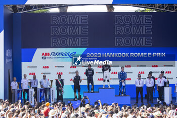 2023-07-15 - Mr Sanghoon Lee, President & COO, Hankook Tire Europe at the podium ceremony, CASSIDY Nick (nzl), Envision Racing, Spark-Jaguar, Jaguar I - Time 6, EVANS Mitch (nzl), Jaguar TCS Racing, Spark-Jaguar, Jaguar I - Time 6, GUNTHER Maximilian (ger), Maserati MSG Racing, Spark-Venturi, portrait during the 2023 Hankook Rome ePrix, 10th meeting of the 2022-23 ABB FIA Formula E World Championship, on the Circuit Cittadino dell’EUR from July 14 to 16, 2023 in Rome, Italy - AUTO - 2023 FORMULA E ROME EPRIX - FORMULA E - MOTORS