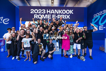 2023-07-15 - Team picture with EVANS Mitch (nzl), Jaguar TCS Racing, Spark-Jaguar, Jaguar I - Time 6, portrait at the podium during the 2023 Hankook Rome ePrix, 10th meeting of the 2022-23 ABB FIA Formula E World Championship, on the Circuit Cittadino dell’EUR from July 14 to 16, 2023 in Rome, Italy - AUTO - 2023 FORMULA E ROME EPRIX - FORMULA E - MOTORS