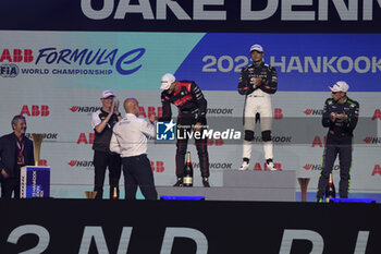 2023-07-29 - Formula E World Champion DENNIS Jake (gbr), Avalanche Andretti Formula E, Spark-Porsche, Porsche 99X Electric, portrait podium EVANS Mitch (nzl), Jaguar TCS Racing, Spark-Jaguar, Jaguar I - Time 6, portrait BUEMI Sébastien (swi), Envision Racing, Spark-Jaguar, Jaguar I - Time 6, portraitduring the 2023 Hankook London ePrix, 12th meeting of the 2022-23 ABB FIA Formula E World Championship, on the ExCeL London from July 29 to 30, 2023 in London, United Kingdom - AUTO - 2023 FORMULA E HANKOOK LONDON EPRIX - FORMULA E - MOTORS