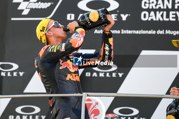 2023-06-11 - Acosta Pedro (Esp)
Team: Red Bull KTM Ajo Moto2 celebrates on the podium after winning the Moto2 Gran Premio d'Italia Oakley - RACE MOTOGP GRAND PRIX OF ITALY - MOTOGP - MOTORS