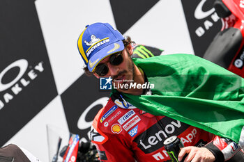 2023-06-11 - Francesco Bagnaia IT Ducati Lenovo Team Ducati celebrates on the podium after winning the Gran Premio d'Italia Oakley - RACE MOTOGP GRAND PRIX OF ITALY - MOTOGP - MOTORS