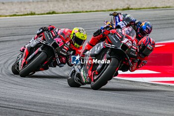 2023-09-03 - Maverick Vinales (12) of Spain and Aprilia Racing Team , Aleix Espargaro (41) of Spain and Aprilia Racing Team and Miguel Oliveira (88) of Portugal and CryptoDATA RNF MotoGP Team during the MOTO GP RACE of the Catalunya Grand Prix at Montmelo racetrack, Spain on September 03, 2023 (Photo: Alvaro Sanchez) Cordon Press - RACES MOTOGP CATALUNYA - MOTOGP - MOTORS