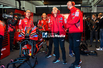2023-11-25 - Davide Tardozzi, Ducati team manager, and Ducati Team portrait waits in the box - 2023 MOTOGP GRAND PRIX OF SPAIN - GRAN PREMIO MOTUL DE LA COMUNITAT VALENCIANA - PADDOCK AND BOX - MOTOGP - MOTORS