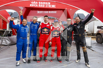2023-01-10 - Celebration of 1-2-3 for BRX with 213 VAIDOTAS Zala (ltu), FIUZA Paulo (prt), Teltonika Racing, BRX, Prodrive Hunter, Auto, 201 LOEB Sébastien (fra), LURQUIN Fabian (bel), Bahrain Raid Extreme, BRX, Prodrive Hunter, Auto, FIA W2RC, 206 CHICHERIT Guerlain (fra), WINOCQ Alex (fra), GCK Motorsport, BRX, Prodrive Hunter, Auto, FIA W2RC, Motul, portrait during the Stage 9 of the Dakar 2023 between Riyadh and Haradh, on January 10th, 2023 in Haradh, Saudi Arabia - AUTO - DAKAR 2023 - STAGE 9 - RALLY - MOTORS
