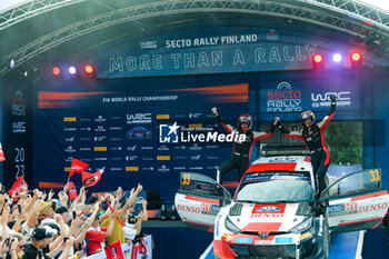 2023-08-06 - The Drive Elfyn Evans (Gb) The Co-Pilot Scott Martin (Gb) Of Team Toyota Gazoo Racing Wrt, Toyota Gr Yaris Rally1 Hybrid ,During Wrc Rally Finland ,They Celebrate During The Final Podium In Himos,2023,06 Aug 2023 Jyvaskyla,Finland - FIA WORLD RALLY CHAMPIONSHIP WRC SECTO AUTOMOTIVE RALLY FINLAND 2023 - RALLY - MOTORS