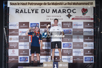 2023-10-18 - COX Bradley (zaf), Bas World KTM Racing Team, KTM 450 Rally Factory Replica, FIM W2RC, LEPAN Jean-Loup (fra), Duust Rally Team, KTM 450 Rally Replica, FIM W2RC, portrait during the Prize giving ceremony of the Rallye du Maroc 2023, on October 18, 2023 around Merzouga, Morocco - AUTO - RALLYE DU MAROC 2023 - RALLY - MOTORS