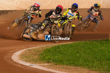 2023-05-27 - (L to R) Matic Ivic (SLO), Tom Brennan (GBR), Eber Ampugnani (ARG) and Mathias Tressarieu (FRA) in action during 2023 FIM Speedway World Championship - Q.R.1, at Santa Marina Circuit in Lonigo (Vicenza), Italy on May 27, 2023. - FIM SPEEDWAY WORLD CHAMPIONSHIP - SPEEDWAY - MOTORS