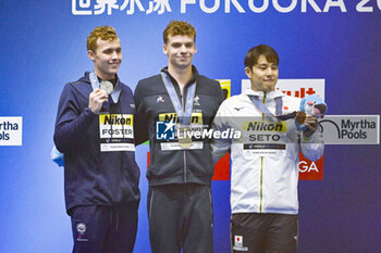 2023-07-24 - Carson Foster of United States 2nd place, Leon Marchand of France Winner, Daiya Seto of Japan 3rd place, Men's 400m Individual Medley Medal Ceremony during the 20th FINA Swimming World Championships Fukuoka 2023 on July 23, 2023 at Marine Messe Fukuoka in Fukuoka, Japan - SWIMMING - WORLD CHAMPIONSHIPS 2023 - SWIMMING - SWIMMING