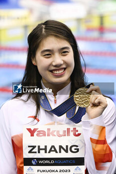 2023-07-24 - Yufei Zhang of China 1st place, Women's 100m Butterfly Medal Ceremony during the 20th FINA Swimming World Championships Fukuoka 2023 on July 24, 2023 at Marine Messe Fukuoka in Fukuoka, Japan - SWIMMING - WORLD CHAMPIONSHIPS 2023 - SWIMMING - SWIMMING