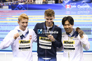 2023-07-27 - Krzysztof Chmielewski of Poland Silver medal, Leon Marchand of France Gold medal, Tomoru Honda of Japan Bronze medal, Men's 200m Butterfly Medal Ceremony during the 20th FINA Swimming World Championships Fukuoka 2023 on July 26, 2023 at Marine Messe Fukuoka in Fukuoka, Japan - SWIMMING - WORLD CHAMPIONSHIPS 2023 - SWIMMING - SWIMMING