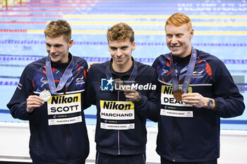 2023-07-28 - Duncan Scott of Great Britain Silver medal, Leon Marchand of France Gold medal, Thomas Dean of Great Britain Bronze medal, Men's 200m Individual Medley Medal Ceremony during the 20th FINA Swimming World Championships Fukuoka 2023 on July 27, 2023 at Marine Messe Fukuoka in Fukuoka, Japan - SWIMMING - WORLD CHAMPIONSHIPS 2023 - SWIMMING - SWIMMING