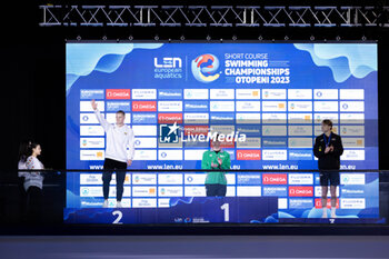 05/12/2023 - Wiffen Daniel of Ireland, Rapsys Danas of Lithuania and Henveaux Lucas of Belgium during the prize giving ceremony for Men’s 400m Freestyle at the LEN Short Course European Championships 2023 on December 5, 2023 in Otopeni, Romania - SWIMMING - LEN SHORT COURSE EUROPEAN CHAMPIONSHIPS 2023 - NUOTO - NUOTO