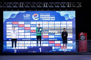 2023-12-05 - Wiffen Daniel of Ireland, Rapsys Danas of Lithuania and Henveaux Lucas of Belgium during the prize giving ceremony for Men’s 400m Freestyle at the LEN Short Course European Championships 2023 on December 5, 2023 in Otopeni, Romania - SWIMMING - LEN SHORT COURSE EUROPEAN CHAMPIONSHIPS 2023 - SWIMMING - SWIMMING