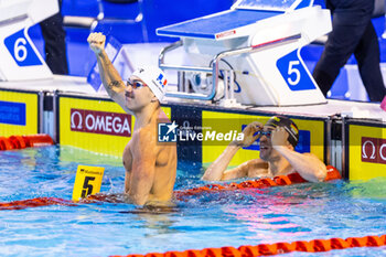 2023-12-06 - Tomac Mewen of France celebrating the win during Men’s 50m Backstroke Final at the LEN Short Course European Championships 2023 on December 6, 2023 in Otopeni, Romania - SWIMMING - LEN SHORT COURSE EUROPEAN CHAMPIONSHIPS 2023 - DAY 2 - SWIMMING - SWIMMING