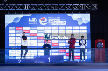 06/12/2023 - Tomac Mewen of France, Braunschweig Ole of Germany, Mora Lorenzo of Italy and Bollin Thierry of Switzerland during the podium ceremony of Men’s 50m Backstroke at the LEN Short Course European Championships 2023 on December 6, 2023 in Otopeni, Romania - SWIMMING - LEN SHORT COURSE EUROPEAN CHAMPIONSHIPS 2023 - DAY 2 - NUOTO - NUOTO