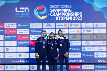 07/12/2023 - Harris Medi of Great Britain, Shanahan Katie of Breat Britain and Mahieu Pauline of France duing the podium ceremony for Women’s 200m Backstroke at the LEN Short Course European Championships 2023 on December 7, 2023 in Otopeni, Romania - SWIMMING - LEN SHORT COURSE EUROPEAN CHAMPIONSHIPS 2023 - DAY 3 - NUOTO - NUOTO