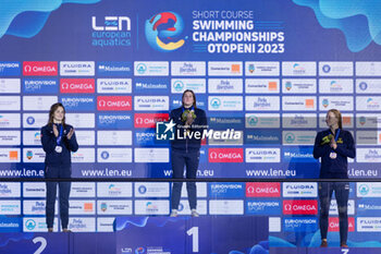 07/12/2023 - Bonnet Charlotte of France, Gastaldello Beryl of France and Hansson Louise of Sweden during the podium ceremony for Women’s 100m Individual Medley at the LEN Short Course European Championships 2023 on December 7, 2023 in Otopeni, Romania - SWIMMING - LEN SHORT COURSE EUROPEAN CHAMPIONSHIPS 2023 - DAY 3 - NUOTO - NUOTO