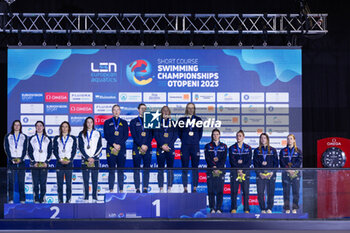 2023-12-07 - Sweden Team, Italy Team and Great Britain Team during the podium ceremony for Women’s 4x50m Medley Relay at the LEN Short Course European Championships 2023 on December 7, 2023 in Otopeni, Romania - SWIMMING - LEN SHORT COURSE EUROPEAN CHAMPIONSHIPS 2023 - DAY 3 - SWIMMING - SWIMMING