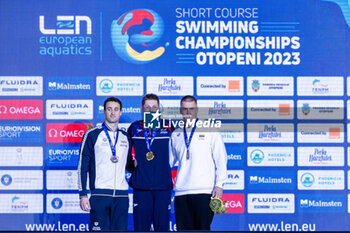 08/12/2023 - Scott Duncan of Great Britain, Razzetti Alberto of Italy and Rapsys Danas of Lithuania during the podium ceremony for Men’s 200m Individual Medley at the LEN Short Course European Championships 2023 on December 8, 2023 in Otopeni, Romania - SWIMMING - LEN SHORT COURSE EUROPEAN CHAMPIONSHIPS 2023 - DAY 4 - NUOTO - NUOTO