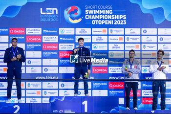 08/12/2023 - Tomac Mewen of France, Ndoye-Brouard Yohann of France, Mora Lorenzo of Italy and Ungur Daniel of Romania during the podium celebration for Men’s 100m Backstroke at the LEN Short Course European Championships 2023 on December 8, 2023 in Otopeni, Romania - SWIMMING - LEN SHORT COURSE EUROPEAN CHAMPIONSHIPS 2023 - DAY 4 - NUOTO - NUOTO