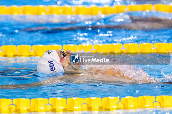 2023-12-08 - Tomac Mewen of France during Men’s 100m Backstroke Final at the LEN Short Course European Championships 2023 on December 8, 2023 in Otopeni, Romania - SWIMMING - LEN SHORT COURSE EUROPEAN CHAMPIONSHIPS 2023 - DAY 4 - SWIMMING - SWIMMING