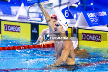 08/12/2023 - Tomac Mewen of France celebrating the win during Men’s 100m Backstroke Final at the LEN Short Course European Championships 2023 on December 8, 2023 in Otopeni, Romania - SWIMMING - LEN SHORT COURSE EUROPEAN CHAMPIONSHIPS 2023 - DAY 4 - NUOTO - NUOTO