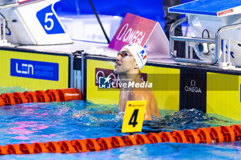 2023-12-08 - Tomac Mewen of France celebrating the win during Men’s 100m Backstroke Final at the LEN Short Course European Championships 2023 on December 8, 2023 in Otopeni, Romania - SWIMMING - LEN SHORT COURSE EUROPEAN CHAMPIONSHIPS 2023 - DAY 4 - SWIMMING - SWIMMING