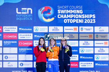 08/12/2023 - Schouten Tes of the Netherlands, Blomsterberg Thea of Denmark and Horska Kristyna of Czech Republic during the podium ceremony for Women’s 200m Breaststroke at the LEN Short Course European Championships 2023 on December 8, 2023 in Otopeni, Romania - SWIMMING - LEN SHORT COURSE EUROPEAN CHAMPIONSHIPS 2023 - DAY 4 - NUOTO - NUOTO