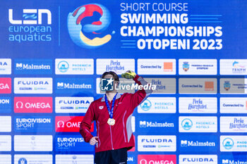 2023-12-08 - Ponti Noe of Switzerland during the podium ceremony for Men’s 200m Butterfly at the LEN Short Course European Championships 2023 on December 8, 2023 in Otopeni, Romania - SWIMMING - LEN SHORT COURSE EUROPEAN CHAMPIONSHIPS 2023 - DAY 4 - SWIMMING - SWIMMING