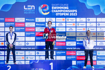 2023-12-08 - Ponti Noe of Switzerland, Razzetti Alberto if Italy and Marton Richard of Hungary during the podium ceremony for Men’s 200m Butterfly at the LEN Short Course European Championships 2023 on December 8, 2023 in Otopeni, Romania - SWIMMING - LEN SHORT COURSE EUROPEAN CHAMPIONSHIPS 2023 - DAY 4 - SWIMMING - SWIMMING