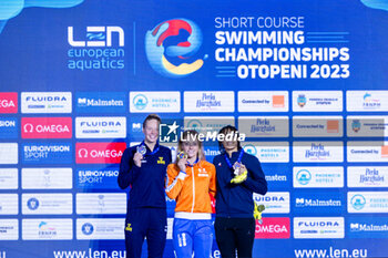 2023-12-08 - Toussaint Kira of the Netherlands, Hansson Louise of Sweden and Pigree Analia of France during the podium ceremony for Women’s 50m Backstroke at the LEN Short Course European Championships 2023 on December 8, 2023 in Otopeni, Romania - SWIMMING - LEN SHORT COURSE EUROPEAN CHAMPIONSHIPS 2023 - DAY 4 - SWIMMING - SWIMMING