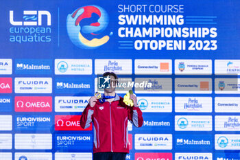 2023-12-08 - Ponti Noe of Switzerland during the podium ceremony for Men’s 200m Butterfly at the LEN Short Course European Championships 2023 on December 8, 2023 in Otopeni, Romania - SWIMMING - LEN SHORT COURSE EUROPEAN CHAMPIONSHIPS 2023 - DAY 4 - SWIMMING - SWIMMING