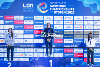 2023-12-08 - Kirpichnikova Anastasiia of France, Quadarella Simona of Italy and Kesely Ajna of Hungary during the podium ceremony for Women’s 1500m Freestyle at the LEN Short Course European Championships 2023 on December 8, 2023 in Otopeni, Romania - SWIMMING - LEN SHORT COURSE EUROPEAN CHAMPIONSHIPS 2023 - DAY 4 - SWIMMING - SWIMMING