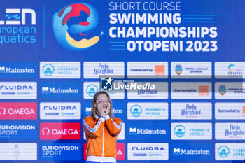 2023-12-09 - Toussaint Kira of the Netherlands during the podium ceremony for Women’s 100m Backstroke at the LEN Short Course European Championships 2023 on December 9, 2023 in Otopeni, Romania - SWIMMING - LEN SHORT COURSE EUROPEAN CHAMPIONSHIPS 2023 - DAY 5 - SWIMMING - SWIMMING
