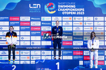 09/12/2023 - Hansson Louise of Sweden, Kohler Angelina of Germany and Ntountounaki Anna of Greece during the podium ceremony for Women’s 100m Butterfly at the LEN Short Course European Championships 2023 on December 9, 2023 in Otopeni, Romania - SWIMMING - LEN SHORT COURSE EUROPEAN CHAMPIONSHIPS 2023 - DAY 5 - NUOTO - NUOTO