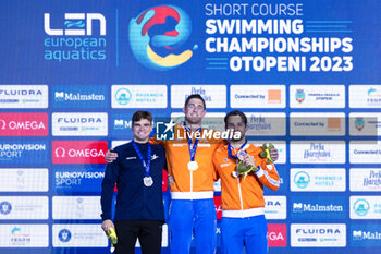 09/12/2023 - Corbeau Caspar of the Netherlands, McKee Anton of Iceland and Kamminga Arno of the Netherlands during the podium ceremony for Men’s 200m Breaststroke at the LEN Short Course European Championships 2023 on December 9, 2023 in Otopeni, Romania - SWIMMING - LEN SHORT COURSE EUROPEAN CHAMPIONSHIPS 2023 - DAY 5 - NUOTO - NUOTO