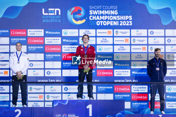 2023-12-09 - Noe Ponti of Switzerland, Szabo Szebasztian of Hungary and Maxime Grousset of France during the podium ceremony for Men’s 50m Butterfly at the LEN Short Course European Championships 2023 on December 9, 2023 in Otopeni, Romania - SWIMMING - LEN SHORT COURSE EUROPEAN CHAMPIONSHIPS 2023 - DAY 5 - SWIMMING - SWIMMING