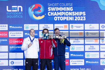 09/12/2023 - Noe Ponti of Switzerland, Szabo Szebasztian of Hungary and Maxime Grousset of France during the podium ceremony for Men’s 50m Butterfly at the LEN Short Course European Championships 2023 on December 9, 2023 in Otopeni, Romania - SWIMMING - LEN SHORT COURSE EUROPEAN CHAMPIONSHIPS 2023 - DAY 5 - NUOTO - NUOTO