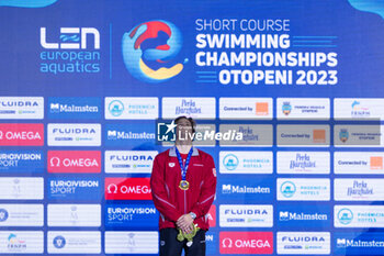 2023-12-09 - Noe Ponti of Switzerland during the podium ceremony for Men’s 50m Butterfly at the LEN Short Course European Championships 2023 on December 9, 2023 in Otopeni, Romania - SWIMMING - LEN SHORT COURSE EUROPEAN CHAMPIONSHIPS 2023 - DAY 5 - SWIMMING - SWIMMING