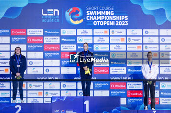 2023-12-09 - Wood Abbie of Great Britain, Bonnet Charlotte of France and Kreundl Lena of Austria during the podium ceremony for Women’s 200m Individual Medley at the LEN Short Course European Championships 2023 on December 9, 2023 in Otopeni, Romania - SWIMMING - LEN SHORT COURSE EUROPEAN CHAMPIONSHIPS 2023 - DAY 5 - SWIMMING - SWIMMING