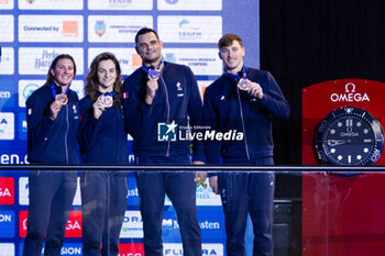 2023-12-09 - Grousset Maxime, Manaudou Florent, Bonnet Charlotte and Gastaldello Beryl of France during the podium ceremony for Mixed 4x50m Freestyle at the LEN Short Course European Championships 2023 on December 9, 2023 in Otopeni, Romania - SWIMMING - LEN SHORT COURSE EUROPEAN CHAMPIONSHIPS 2023 - DAY 5 - SWIMMING - SWIMMING