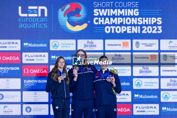 10/12/2023 - Anderson Freya of Great Britain, Seemanova Barbara of Czech Republic and Colbert Freya of Great Britain during the podium ceremony for Women’s 200m Freestyle at the LEN Short Course European Championships 2023 on December 10, 2023 in Otopeni, Romania - SWIMMING - LEN SHORT COURSE EUROPEAN CHAMPIONSHIPS 2023 - DAY 6 - NUOTO - NUOTO