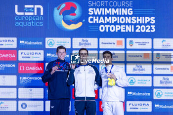 10/12/2023 - Razzetti Alberto of Italy, Scott Duncan of Great Britain and Papastamos Apostolos of Greece during the podium ceremony for Men’s 400m Individual Medley at the LEN Short Course European Championships 2023 on December 10, 2023 in Otopeni, Romania - SWIMMING - LEN SHORT COURSE EUROPEAN CHAMPIONSHIPS 2023 - DAY 6 - NUOTO - NUOTO